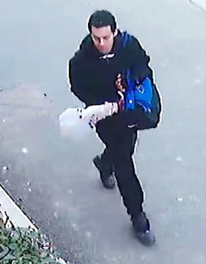 Handout CCTV still dated 27 April 2021 of Callum Wheeler walking on Roger’s Close in Aylesham, Kent, with a blue and black holdall and long object poking out