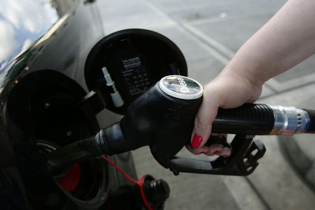 <p>Forecourts were urged to pass the tax cut to motorists to to help with rising fuel prices</p>