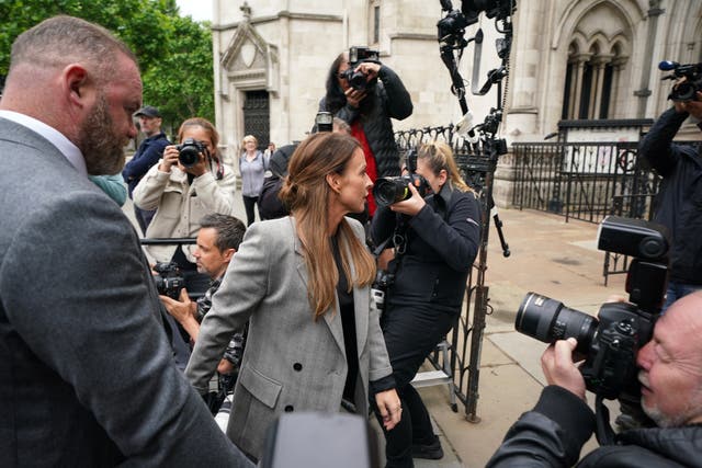 Coleen and Wayne Rooney arrive at the Royal Courts Of Justice (Yui Mok/PA)