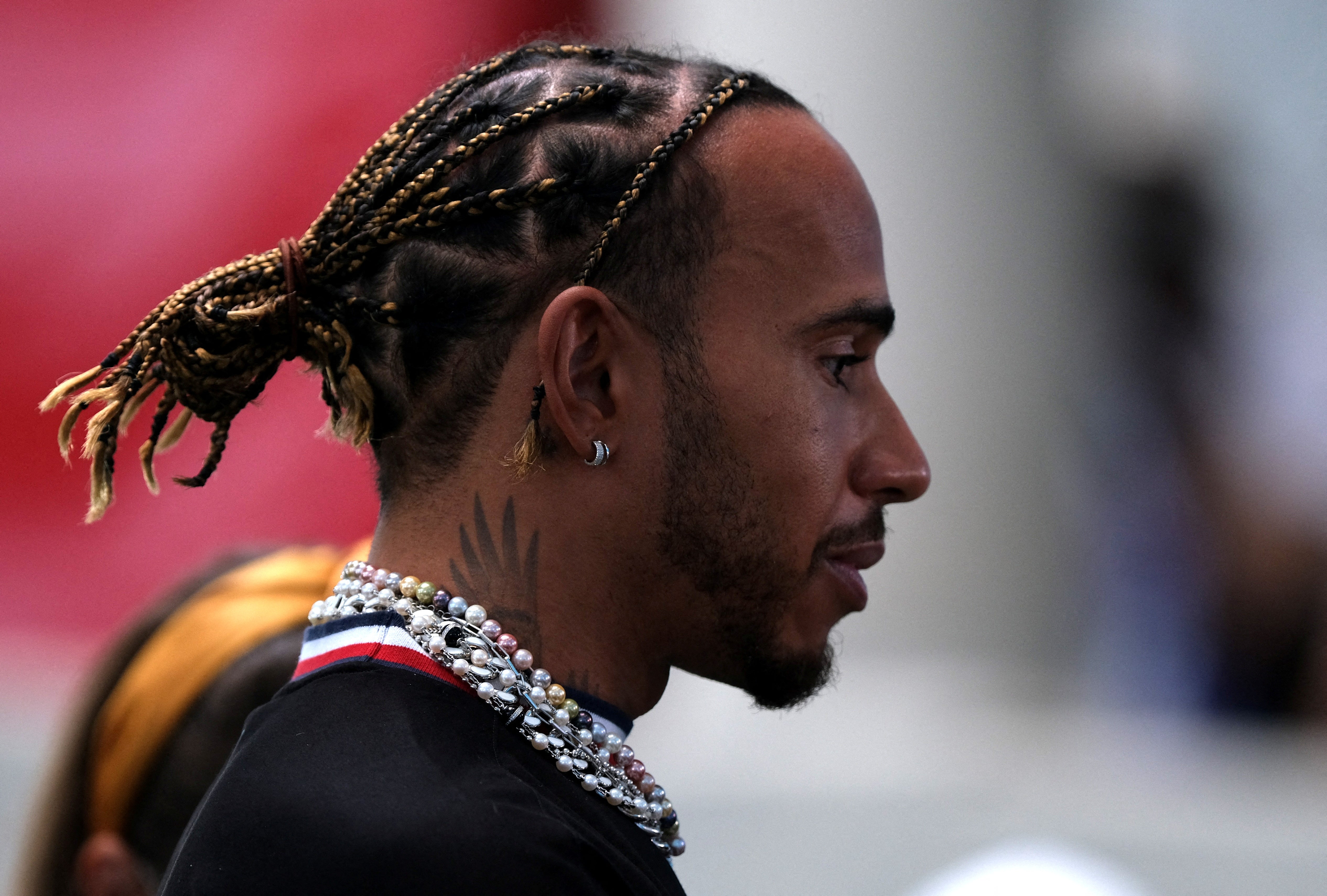 Lewis Hamilton sports a necklace and earings in Miami