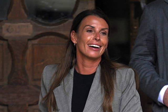 Coleen Rooney leaves the Royal Courts of Justice (Yui Mok/PA)