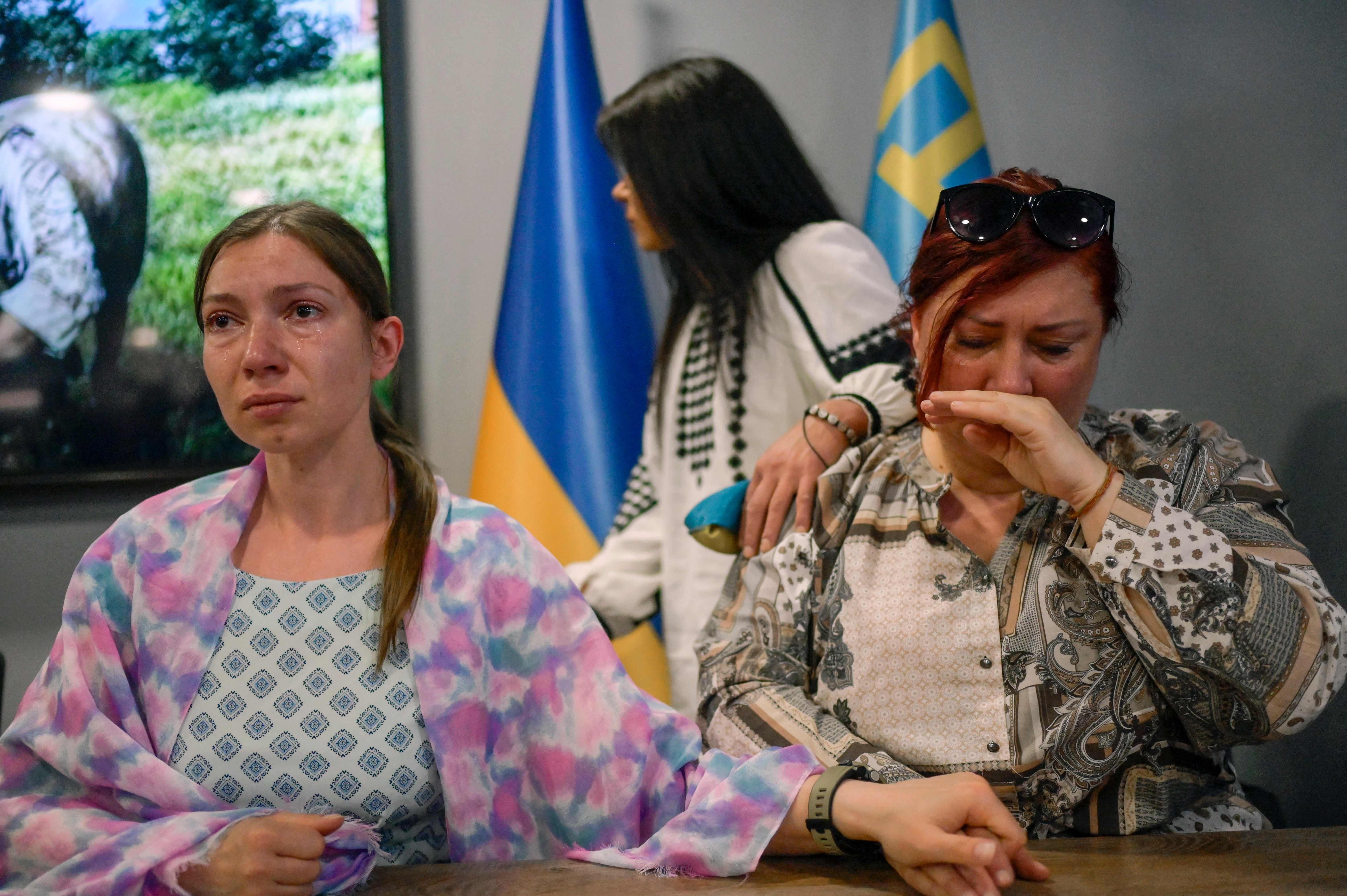 Natalia Zarytska (L), wife of an Azov fighter, and Natalia (R), mother of an Azov fighter, attend a press conference, in Istanbul