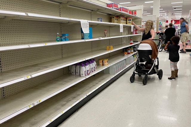 <p>A woman shops for baby formula at Target in Annapolis, Maryland, on May 16, 2022</p>