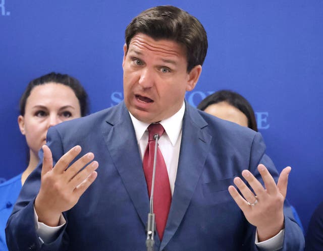 <p>Florida governor Ron DeSantis answers questions during a press conference at Seminole State College in Sanford on Monday</p>
