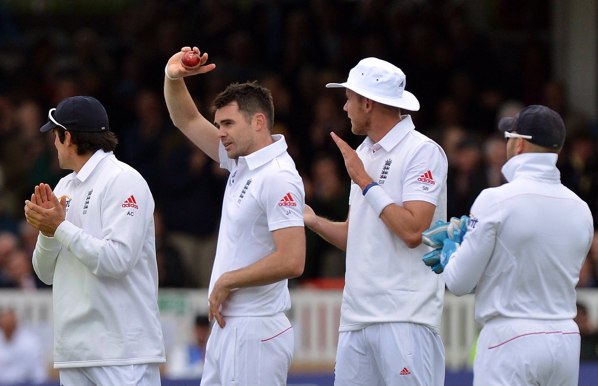 James Anderson holds the ball aloft after taking his 300th Test wicket (Anthony Devlin/PA)