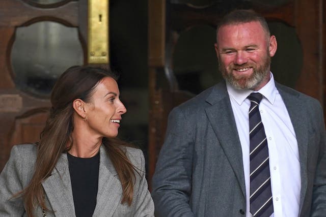 Coleen and Wayne Rooney at the Royal Courts Of Justice (PA)