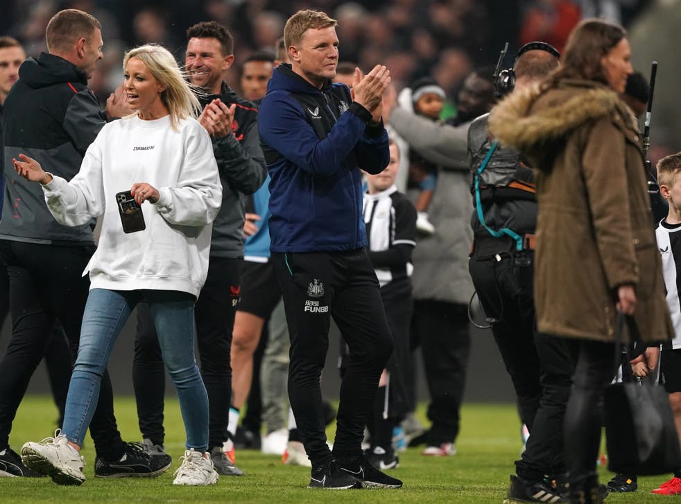 <p>Eddie Howe was on the pitch with his Newcastle players, staff and their families after the win over Arsenal </p>