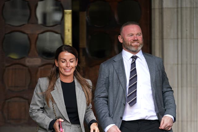 Coleen and Wayne Rooney leaving the Royal Courts Of Justice, London, as the high-profile libel battle between Rebekah Vardy and Coleen Rooney continues. Picture date: Monday May 16, 2022.