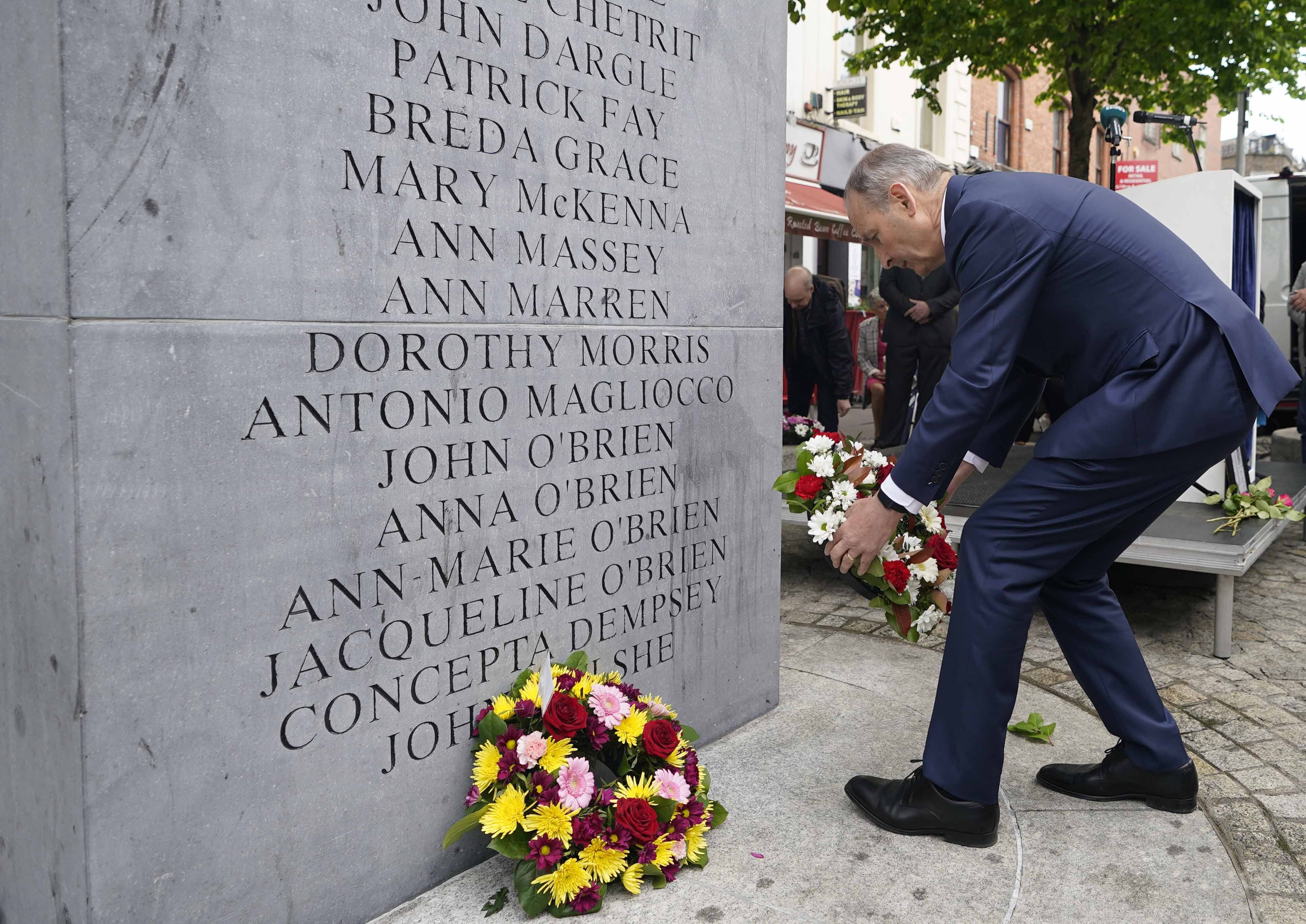 Taoiseach Micheal Martin lays a wreath in Dublin during a ceremony marking the 48th anniversary of the Dublin and Monaghan bombings (PA)