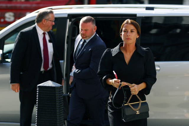 <p>Wayne and Coleen Rooney arrive at the High Court  </p>