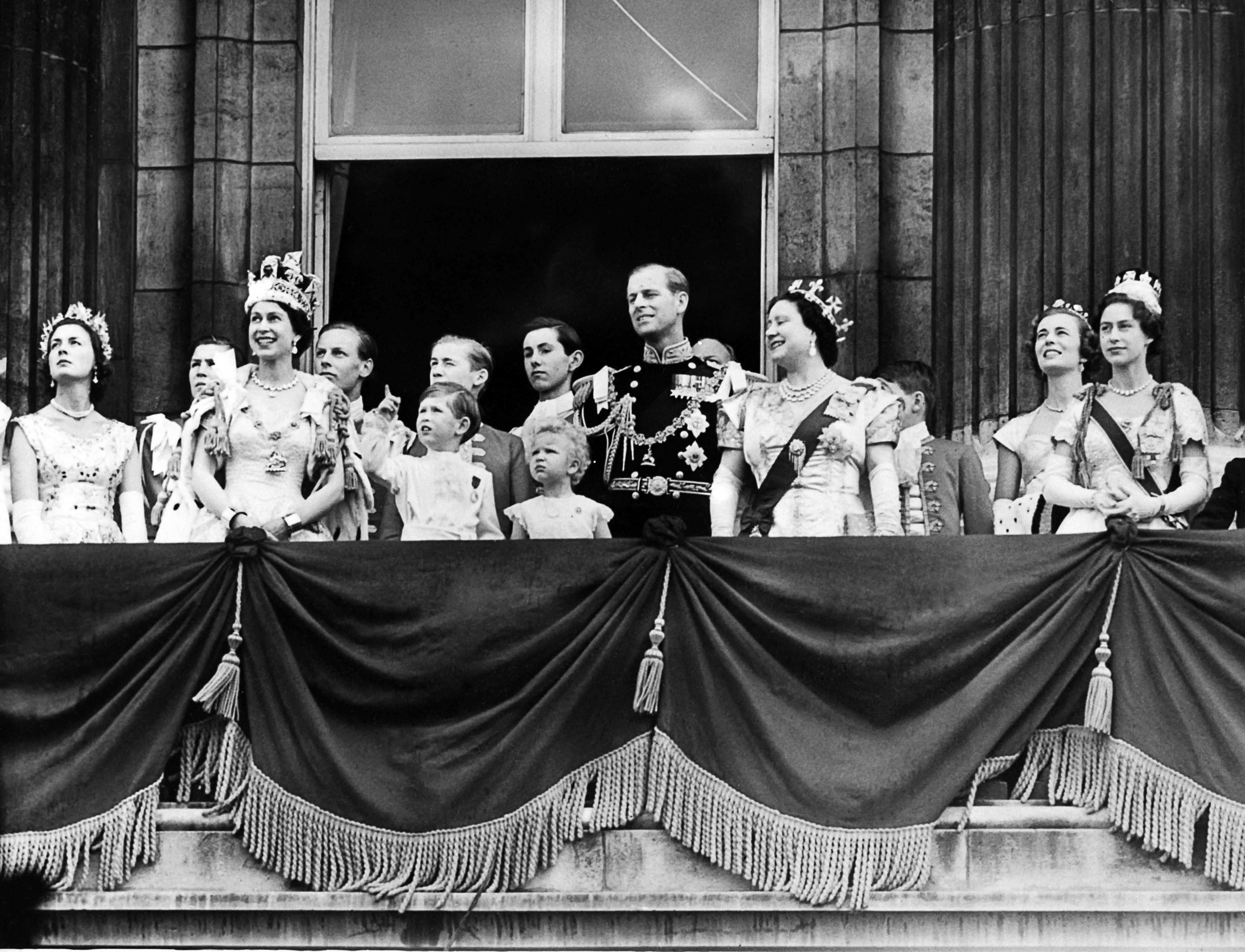 The Queen, Prince Philip, Prince Charles, Princess Anne, the Queen Mother and Princess Margaret appear on the balcony of Buckingham Palace to mark the coronation