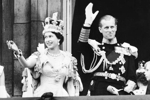 <p>Queen Elizabeth II accompanied by Prince Philip on the day of her coronation in 1953</p>