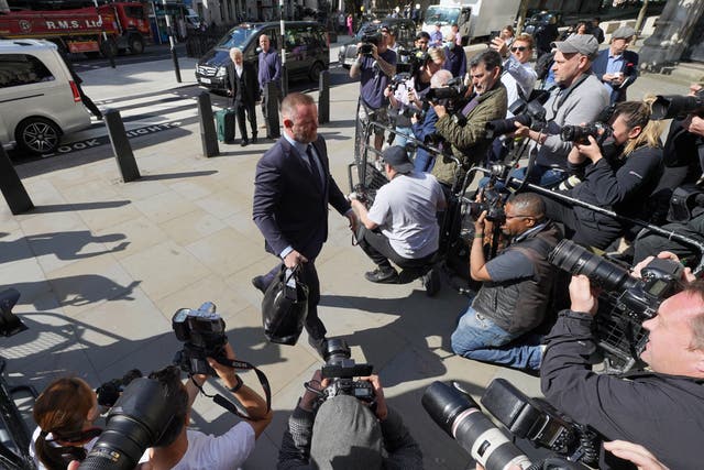 Wayne Rooney arrives at the Royal Courts of Justice, London, as the high-profile libel battle between Rebekah Vardy and Coleen Rooney continues (Yui Mok/PA)