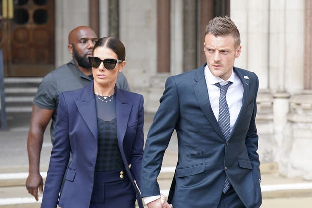 <p>Rebekah and Jamie Vardy leave the Royal Courts of Justice (Yui Mok/PA)</p>