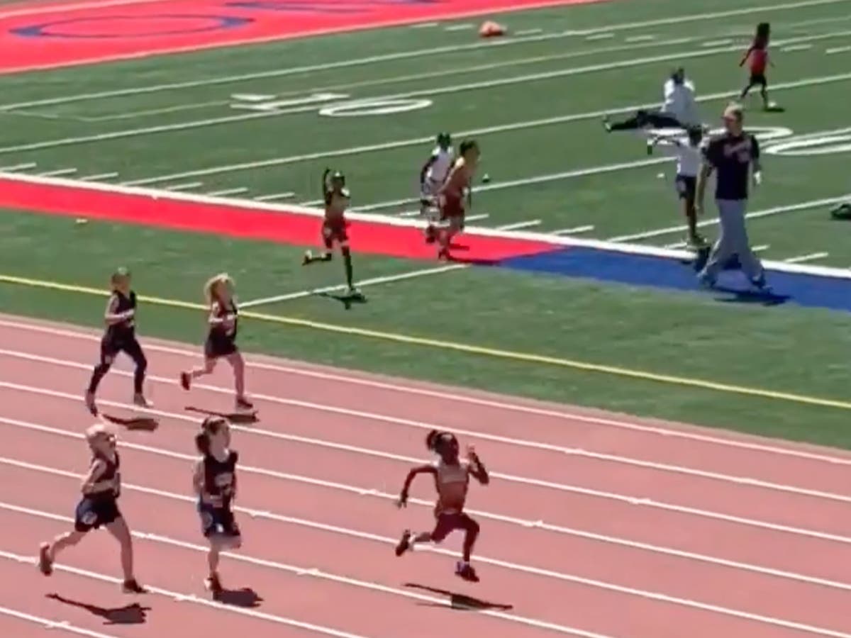 Stunning moment seven-year-old girl wins race after her shoe fell off at starting line Stunning moment seven-year-old girl wins race after her shoe fell off at starting line
