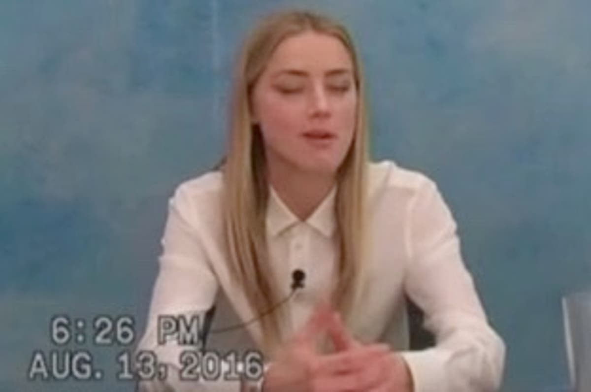 Amber Heard smiles in 2016 deposition when asked about audio of her admitting to striking Johnny Depp Amber Heard smiles in 2016 deposition when asked about audio of her admitting to striking Johnny Depp