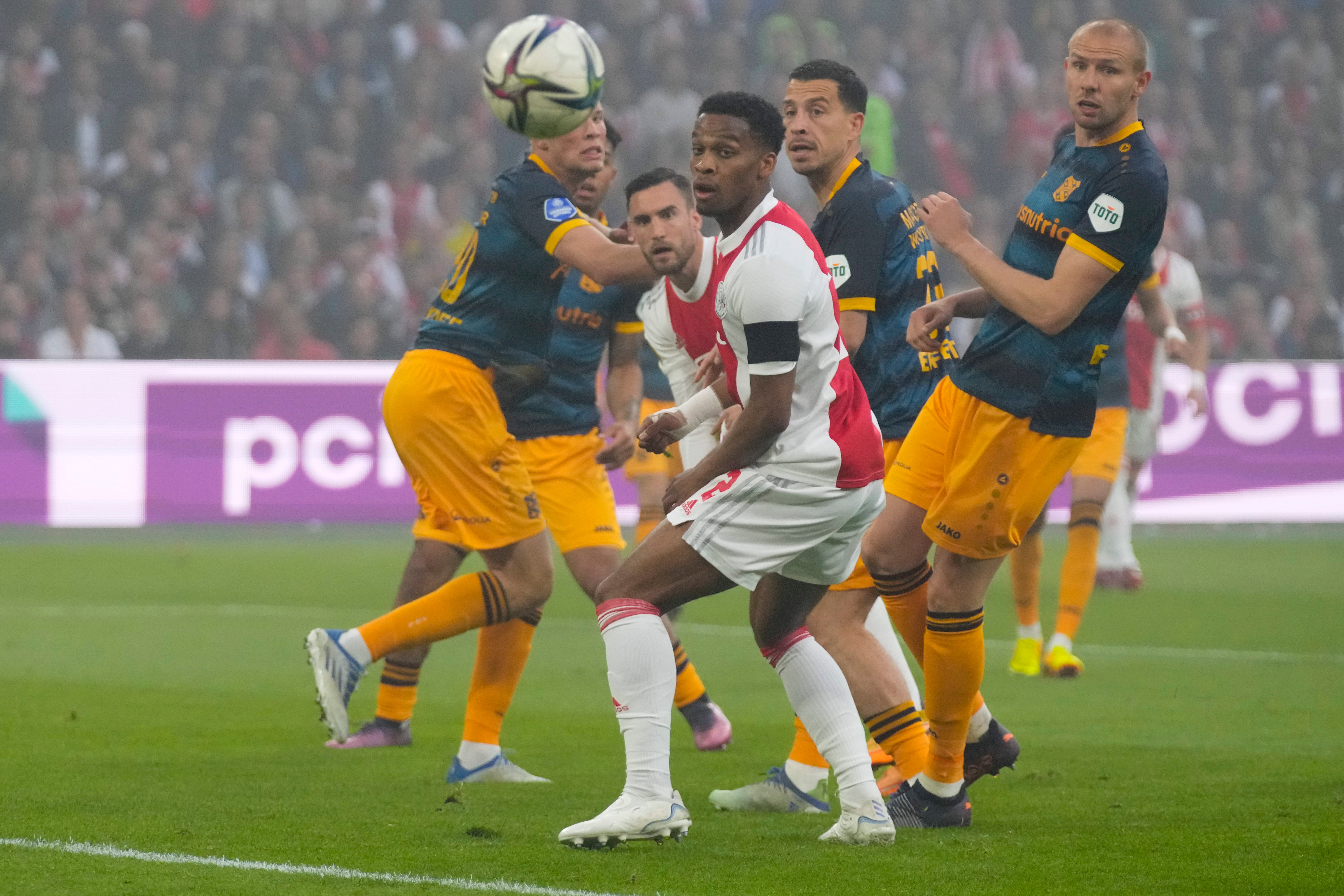 Jurrien Timber in action for Ajax (Peter Dejong/AP)