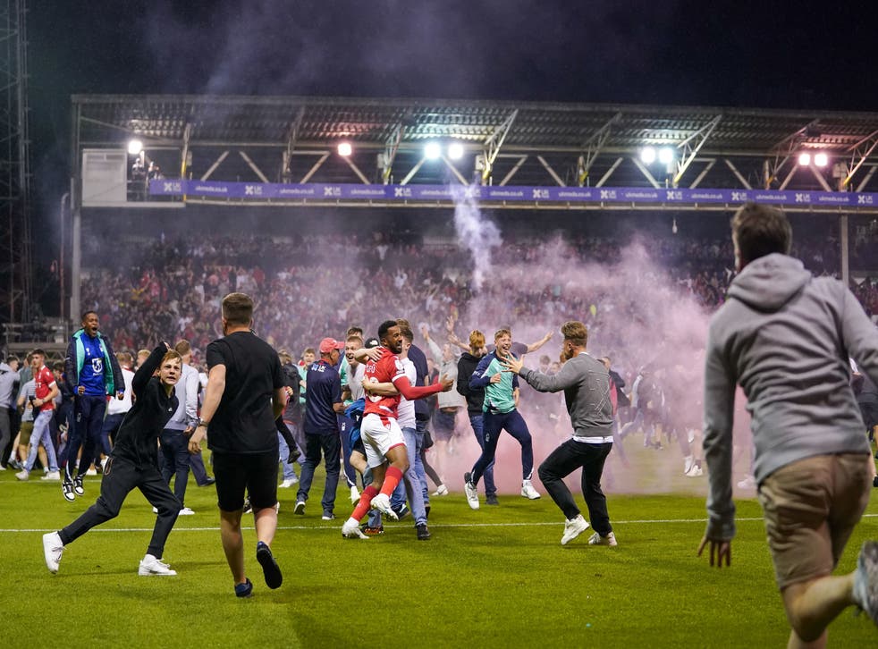 <p>Fans swarm the pitch after Nottingham Forest beat Sheffield United</p>