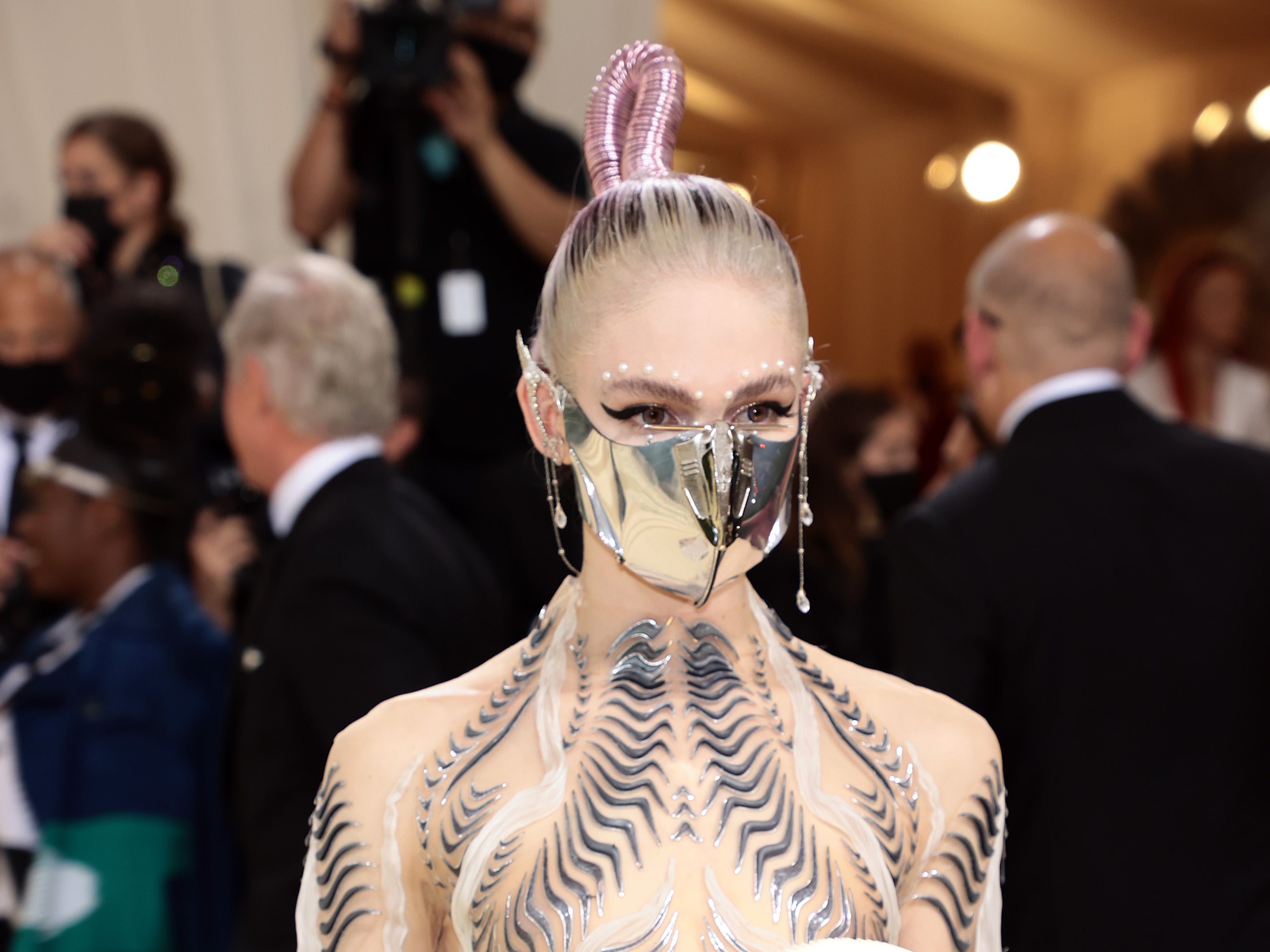 Grimes is selling her Met Gala accessories to raise money for