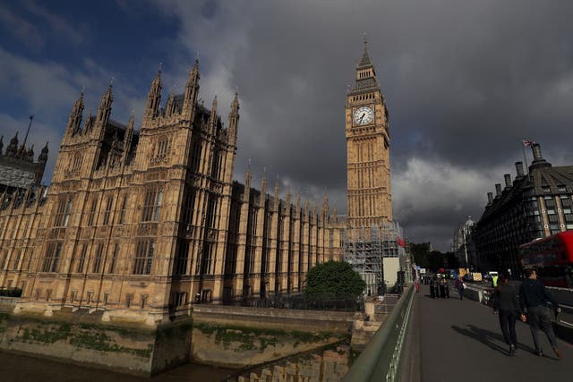 <p>Storm clouds above the Palace of Westminster (Andrew Matthews/PA)</p>