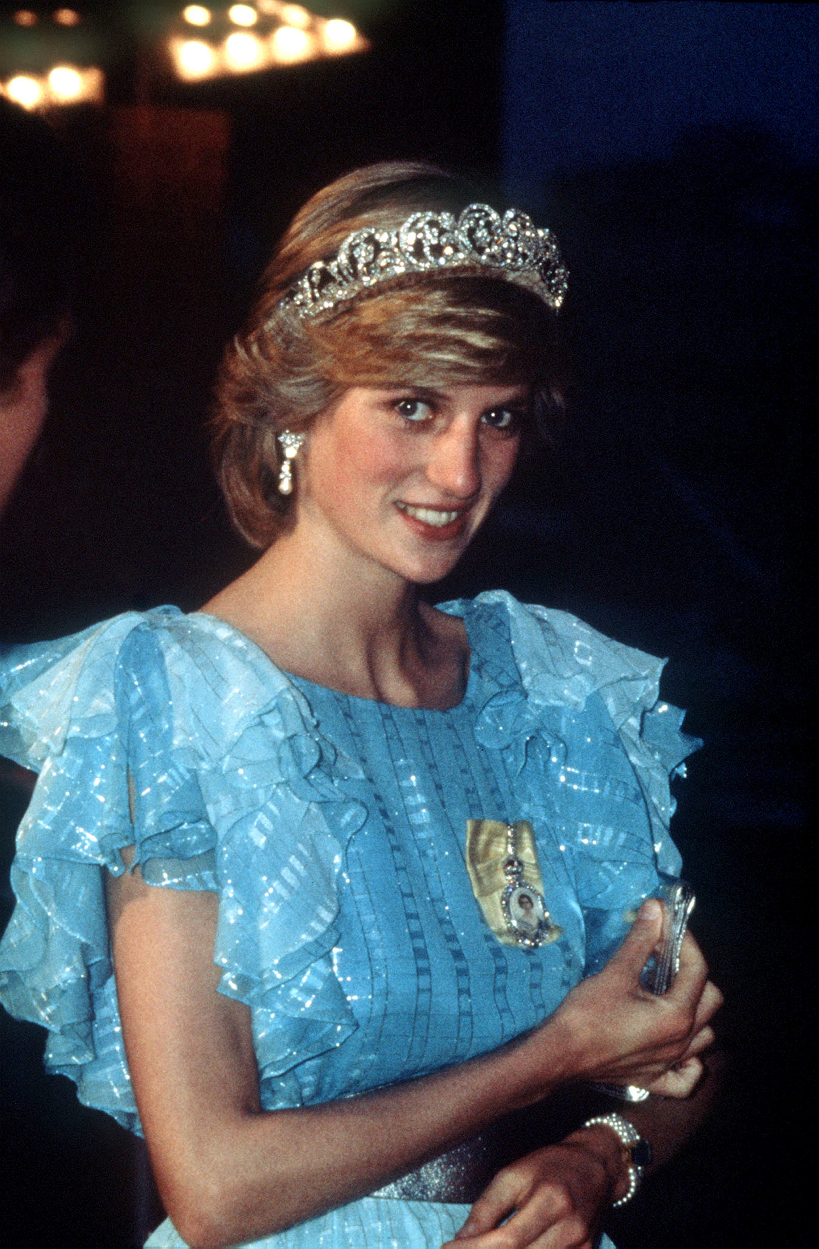 Diana, Princess of Wales, wearing the Spencer family tiara attending a state dinner during a tour to Canada in 1983 (PA)