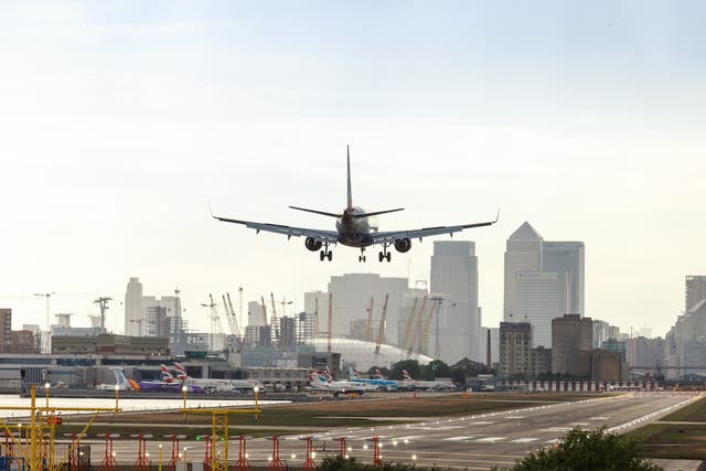 <p>A plane landing at London City</p>