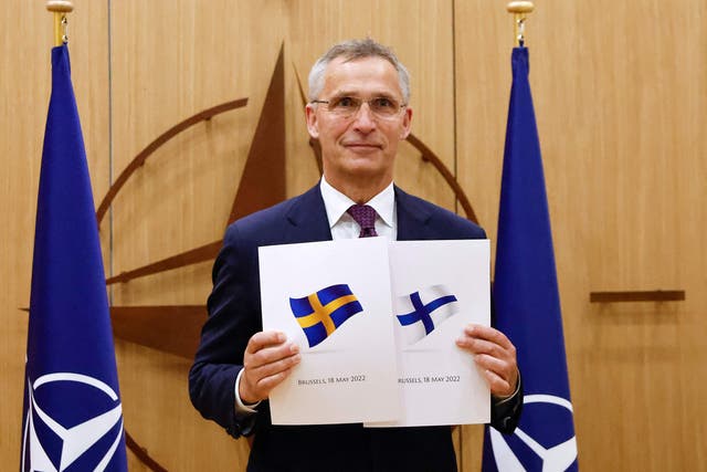 <p>Nato Secretary-General Jens Stoltenberg poses during a ceremony to mark Sweden’s and Finland’s application for membership in Brussels</p>