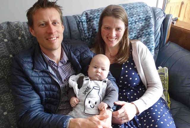 Mikey and Bethany Bryant at home with baby Finley (Swansea Bay UHB/Mikey Bryant/PA)