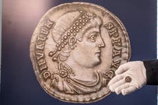 Roman silver coins discovered by veteran treasure hunters sells for thousands