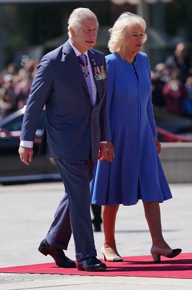 The Prince of Wales and Duchess of Cornwall attend a Wreath Laying Ceremony at the National War Memorial in Ottawa (Jacob King/PA)