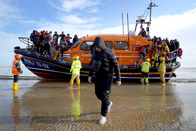 A group of people thought to be migrants are brought in to Dungeness, Kent (Gareth Fuller/PA)