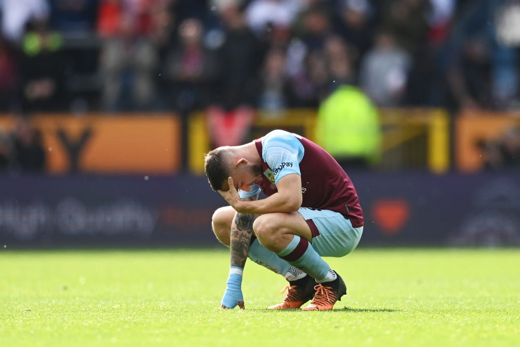 Turf war: Burnley have two games to save their Premier League status