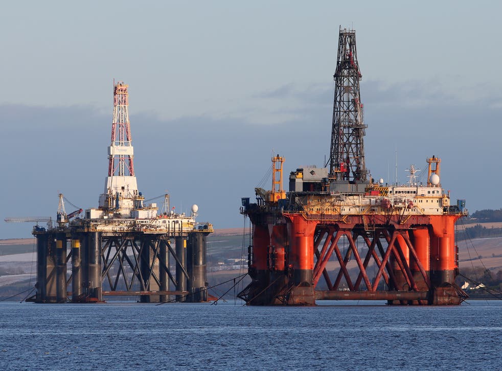 An oil platform stands amongst other rigs which have been left in the Cromarty Firth near Invergordon in the Highlands of Scotland. Rig platforms are being stacked up in the Cromarty Firth as oil prices continue to decline having a major impact on the UK’s North Sea oil industry leaving thousands of people out of work.