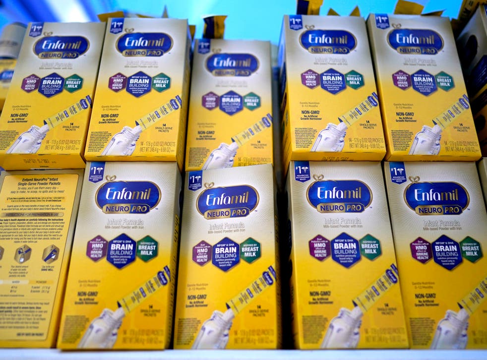 <p>Infant formula is stacked on a table during a baby formula drive to help with the shortage </p>