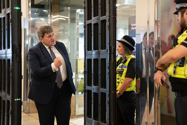 <p>Kit Malthouse meets police officers on 16 May </p>