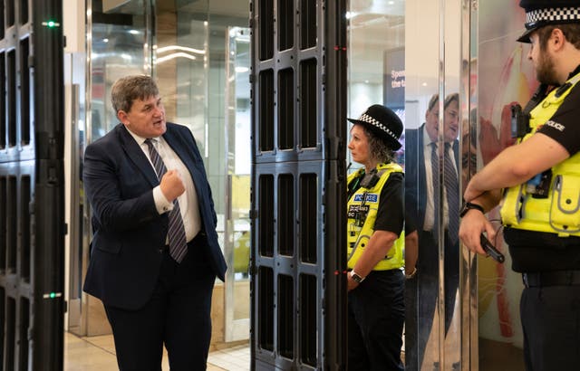 <p>Kit Malthouse meets police officers on 16 May </p>