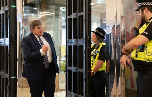 <p>Kit Malthouse meets police officers on 16 May </p>