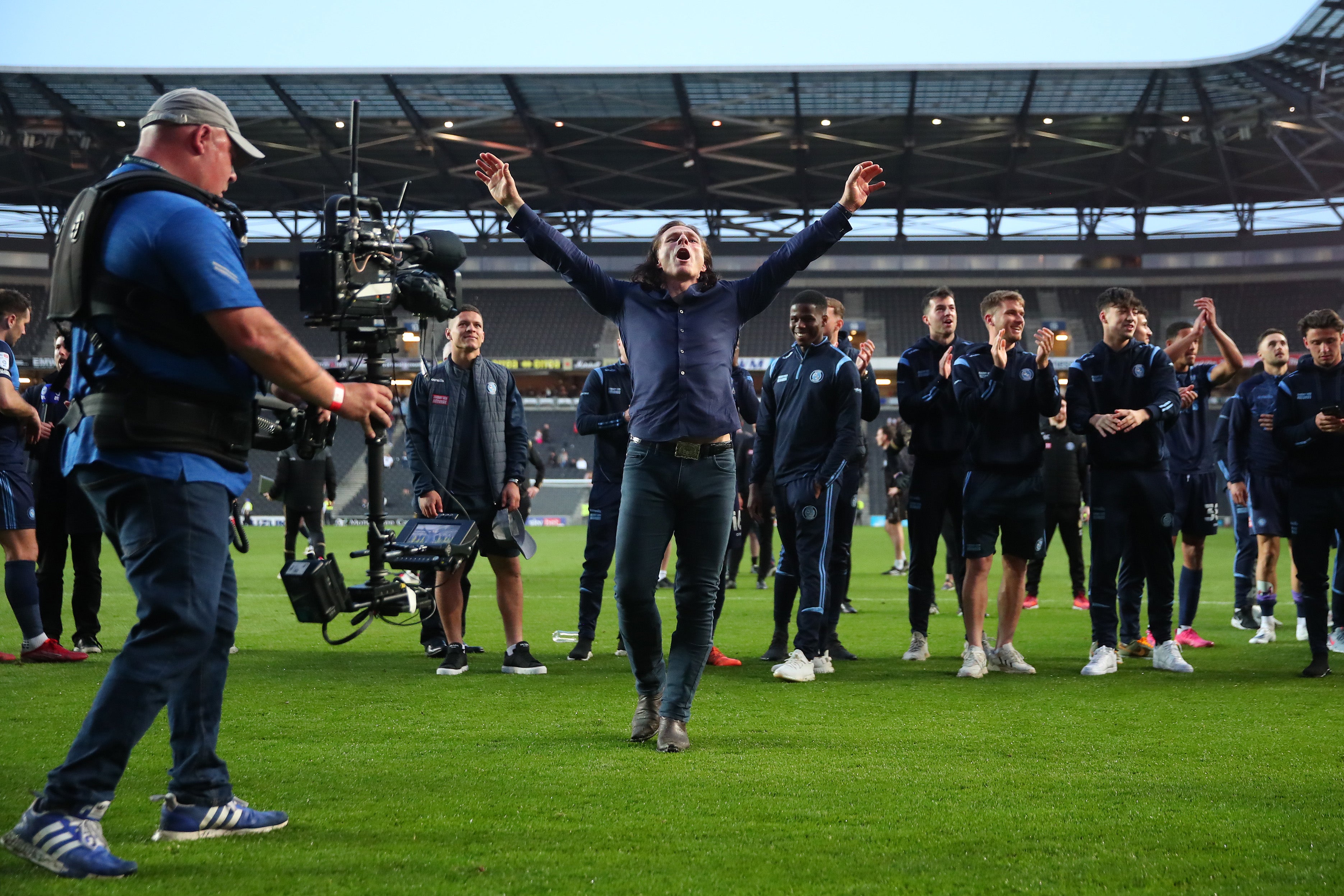 Gareth Ainsworth leads Wycombe’s celebrations after beating MK Dons in the semi-final