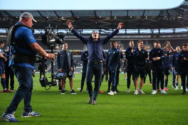 <p>Gareth Ainsworth leads Wycombe’s celebrations after beating MK Dons in the semi-final</p>
