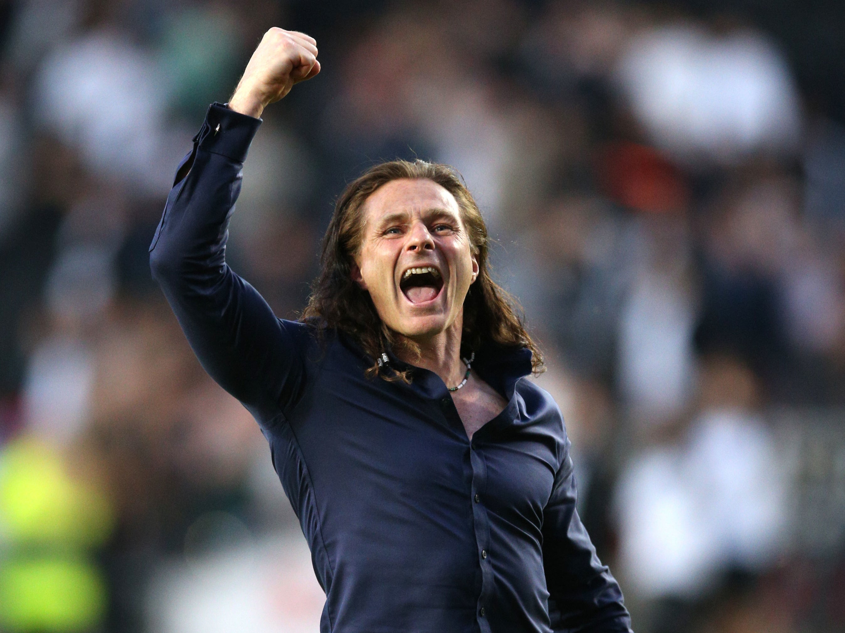 Wycombe manager Gareth Ainsworth celebrates beating MK Dons in the semi-finals