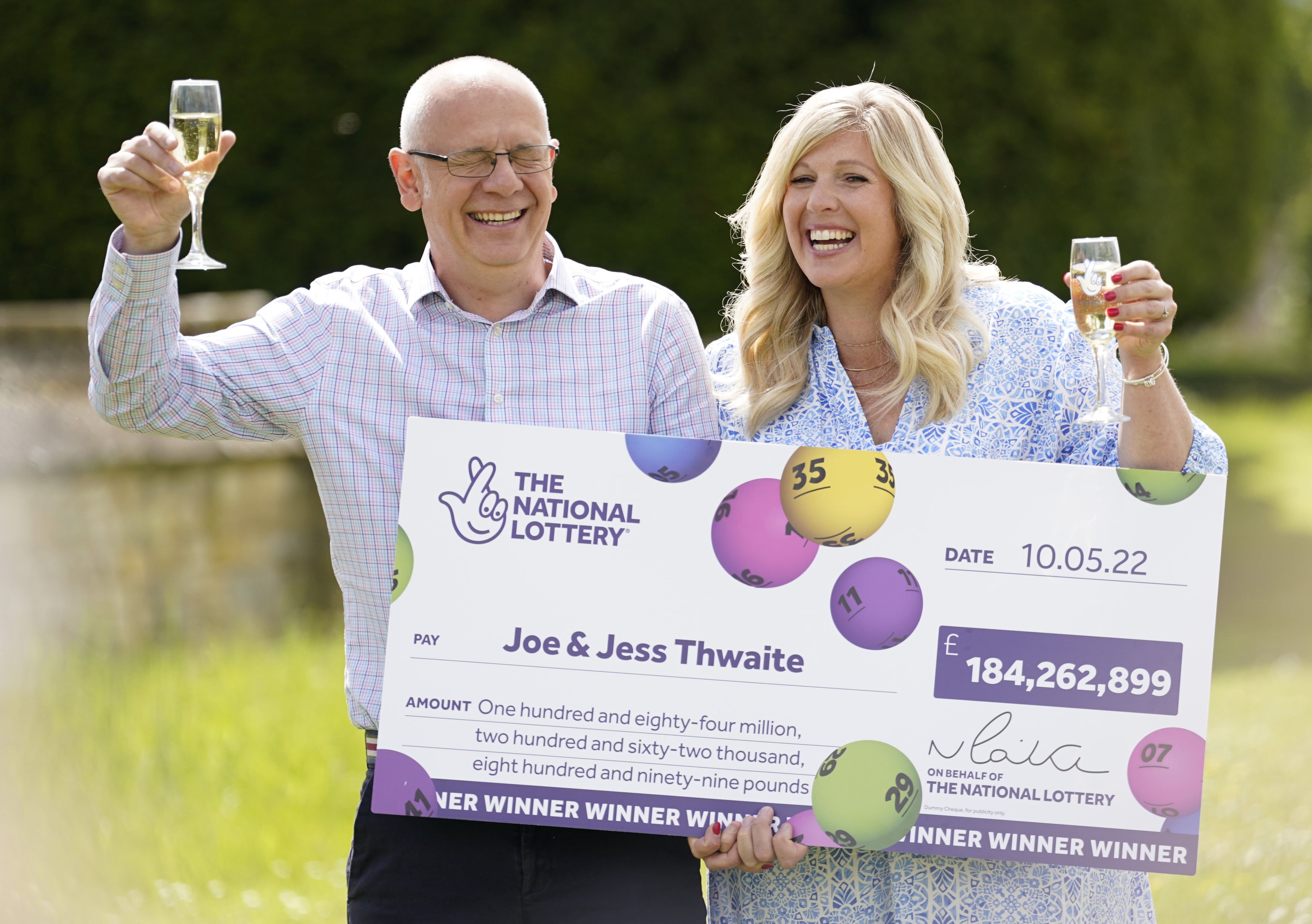 Joe Thwaite and Jess Thwaite celebrate after winning the record-breaking EuroMillions jackpot (Andrew Matthews/PA)