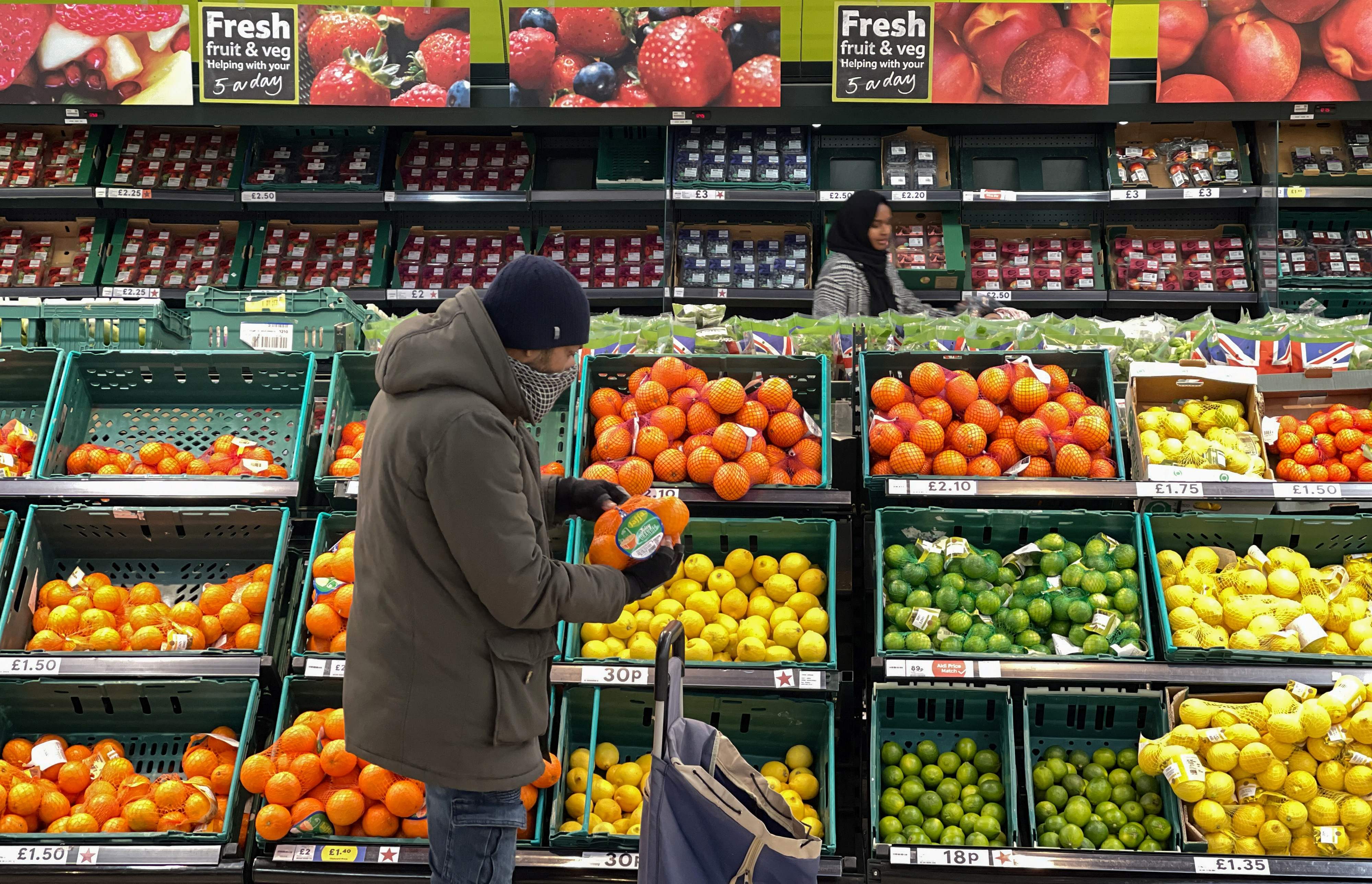 Photo of a customer shopping at a supermarket in London