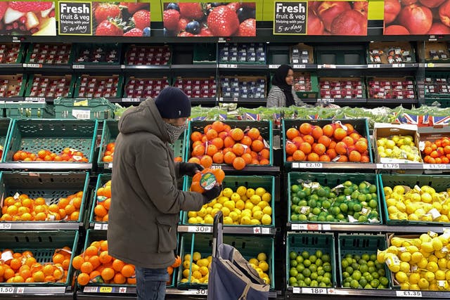 <p>Photo of a customer shopping at a supermarket in London </p>