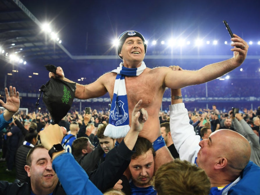 Everton fans celebrate avoiding relegation