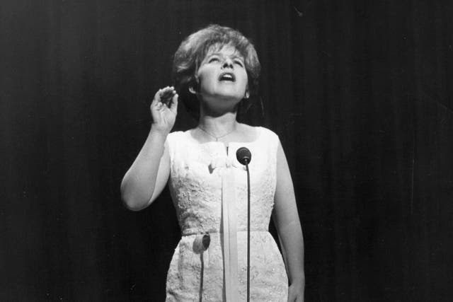 <p>Note perfect: the singer performing at the London Palladium in 1964</p>