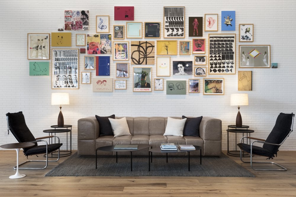 Boutique style is evident throughout the Kimpton Everly Hotel - enjoy a classic cocktail under a wall of contemporary art