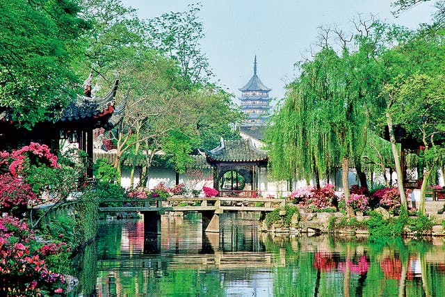 <p>A tower in the distance is part of the view at the Humble Administrator’s Garden in Suzhou</p>