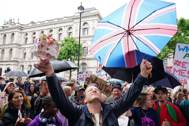 Chef Jamie Oliver takes part in the What An Eton Mess demonstration outside Downing Street (Dominic Lipinski/PA)