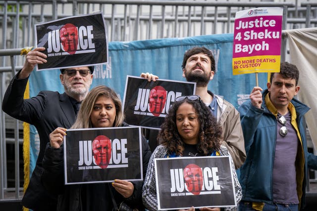 Supporters of the Bayoh family outside Capital House in Edinburgh for the public inquiry into his death (Jane Barlow/PA)