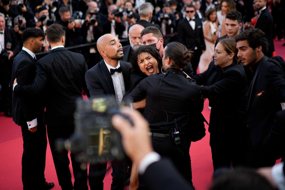 Protester crashes Cannes carpet at George Miller premiere